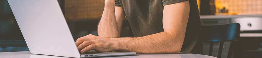 A man using his laptop