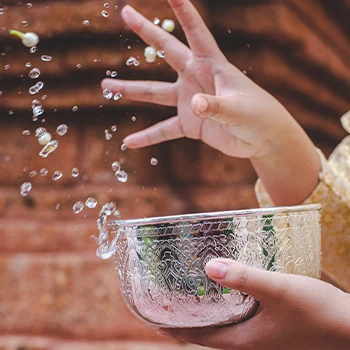 Splashing a bowl of warm water