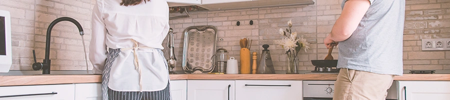 A couple cooking at home together