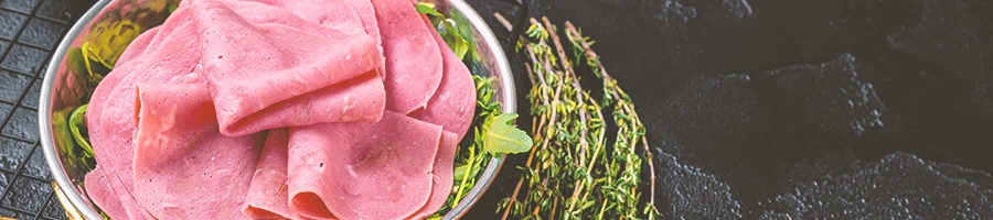 Top view of a stack of deli turkey ham