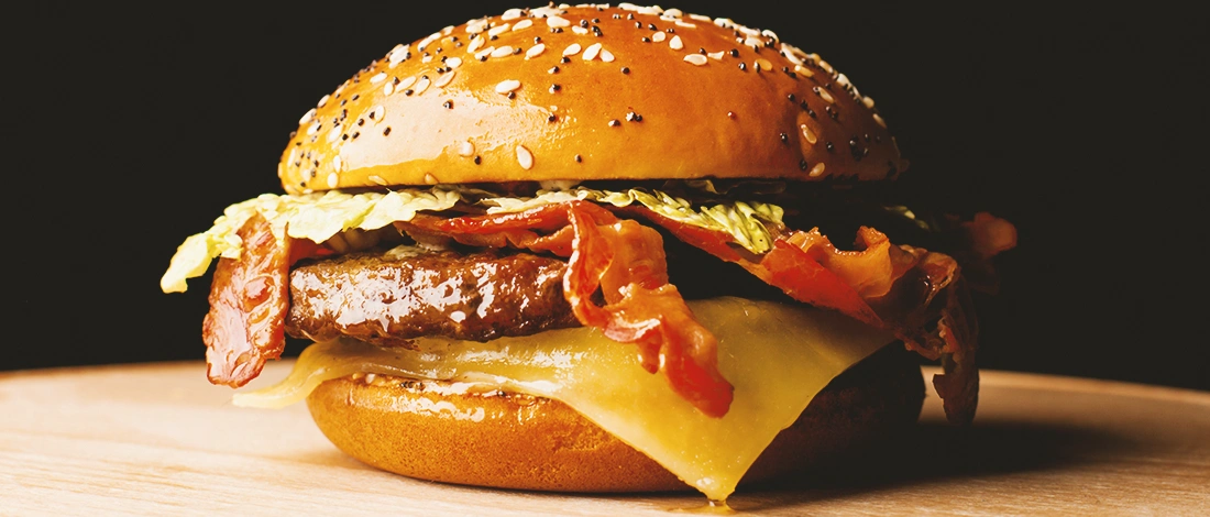 A close up shot of a hamburger