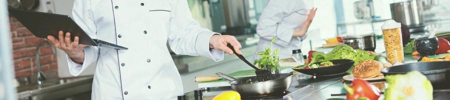 A chef cooking in a kitchen