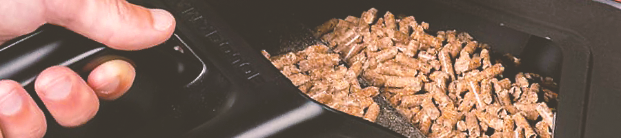 Wooden pellet fuel inside a smoker