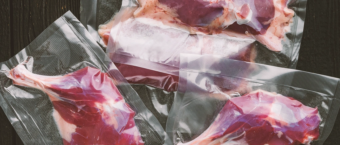A stack of vacuum sealed duck meat