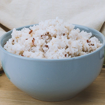 A close up shot of a bowl of rice