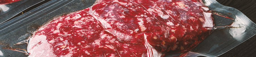 Close up shot of vacuum sealed meat