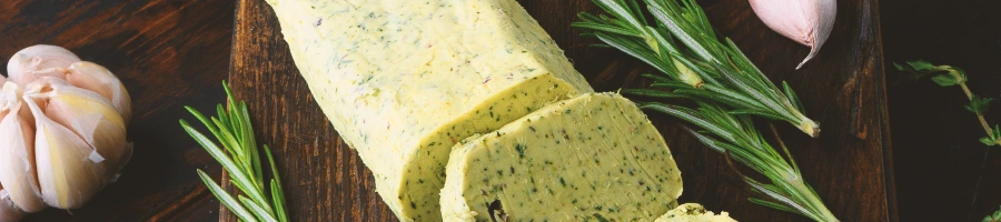 Butter with herbs and garlic on the side