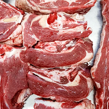 A top view of different slices of fresh beef