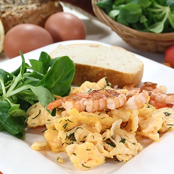 An image of shrimp and egg dish on a plate