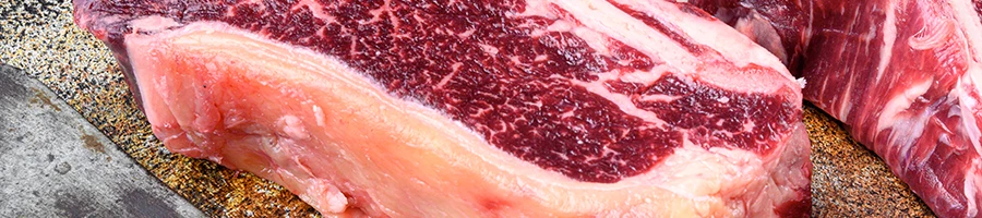 A close up image of a raw steak