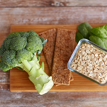 Fiber rich foods on top of a cutting board