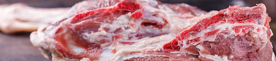 A close up image of raw lamb leg