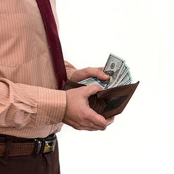 A person pulling out money from a wallet