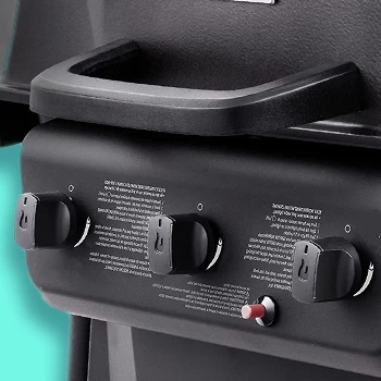 A close up view of an ignition of a grill