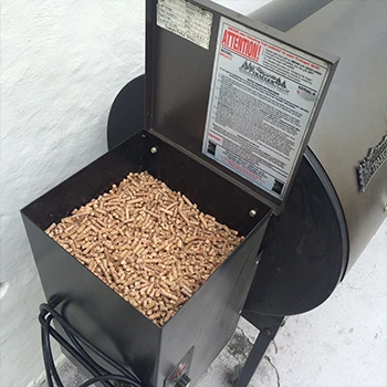 An image of wood pellets inside a pellet smoker