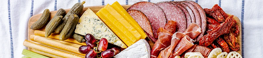 Close up image of meats used in a charcuterie board