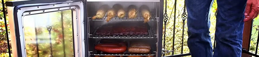 A close up image of open Masterbuilt smoker