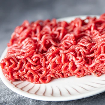 A close up image of ground beef on a plate