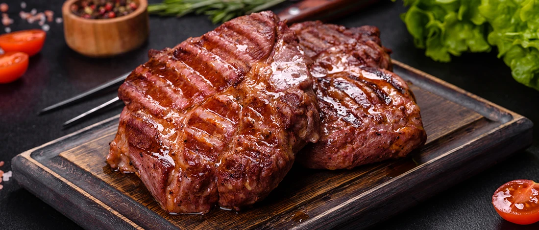 A close up image of a large cooked meat