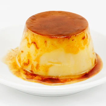 A close up image of carnivore egg pudding on a white plate