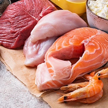 A close up image of beef, chicken, and fish meat