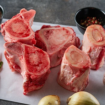 A close up image of meat bones on a paper