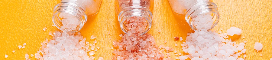 An image of salt pouring out of the shaker