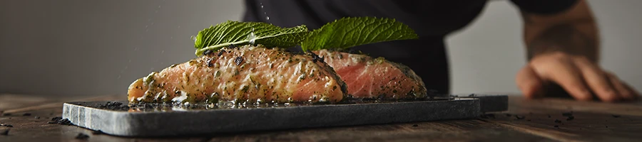 An image of cooked fish on a plate