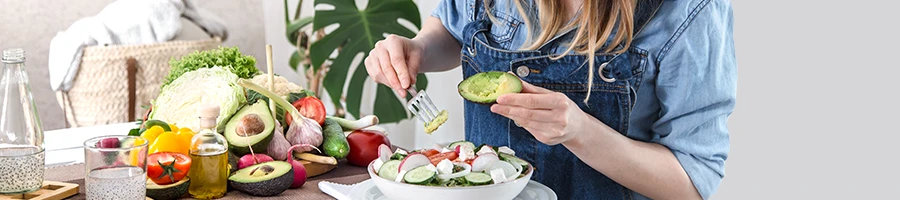 A person having a healthy vegan meal