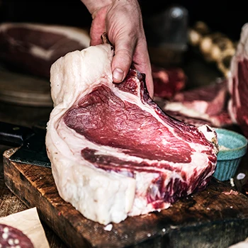 An image of aging beef on a cutting board