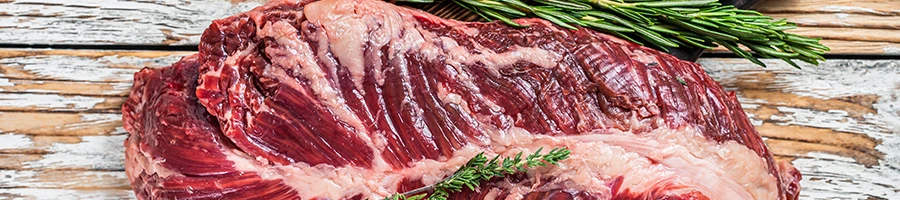 A close up image of raw kosher meat