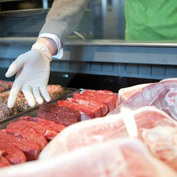 An image of a butcher showing beef meats