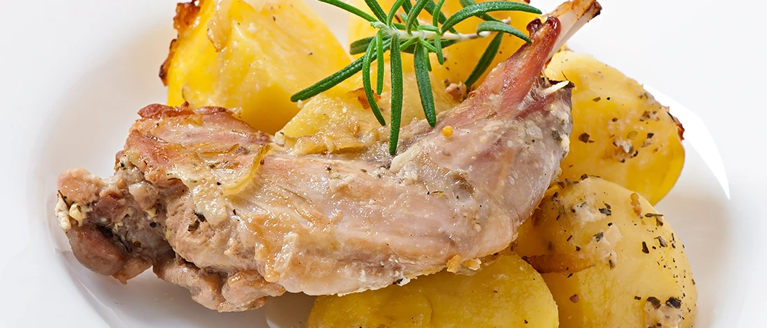 A close up image of low-calorie rabbit meat dish with potatoes