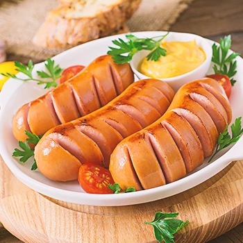 An image of pork sausage on a white plate