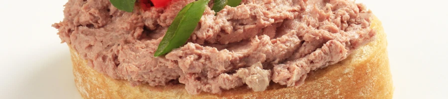 An image of a potted meat on top of a toasted bread
