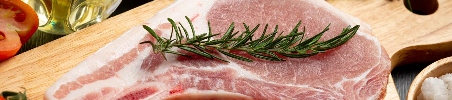A close up image of raw pork meat that is rich in thiamine
