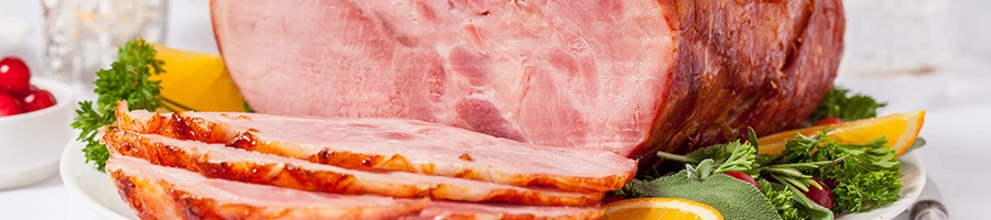 A close up image of sliced gammon meat