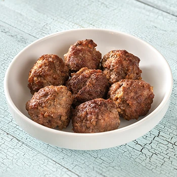 An image of carnivore diet meatballs in a white bowl