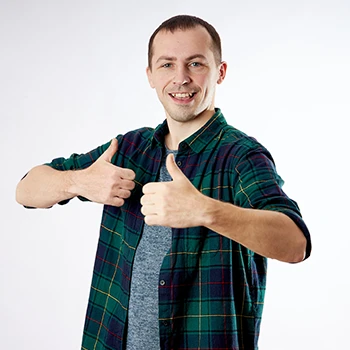 An image of a man showing two thumbs up for extended warranty on George Foreman grills
