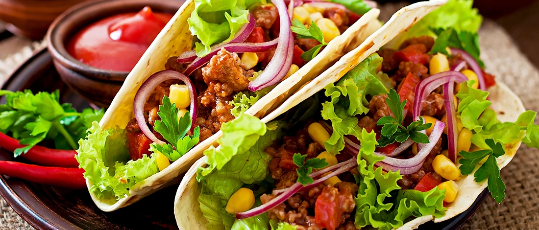 A close up image of a Mexican tacos on a plate