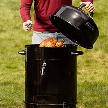 An image of a guy checking the smoker size of a drum smoker