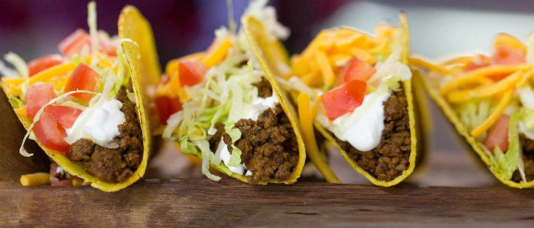 A close up image of tacos in Taco Bell