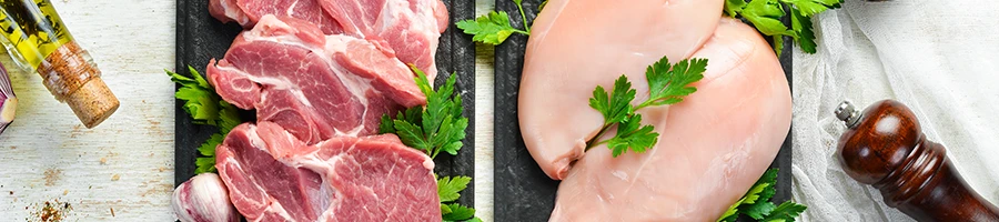 A top view shot of healthier beef than chicken meat on a table top