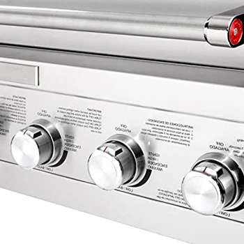 A close up image of a gas grill with many burners