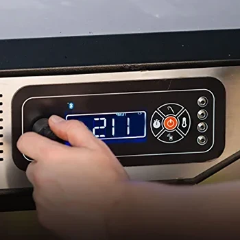 An image of a person adjusting the temperature of a pellet grill