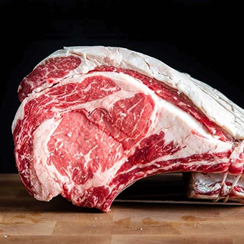 A raw prime rib roast perfect for rotisserie grilling