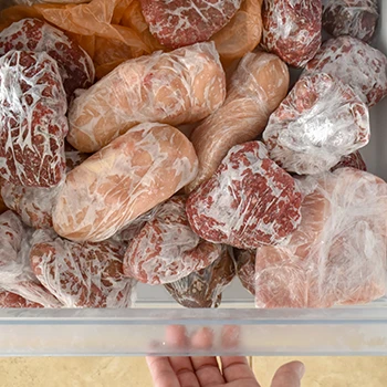 A freezer full of different meats