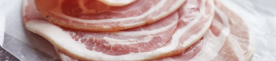 A close up shot of pancetta slices