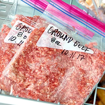 Ground beef on an air-sealed bag with date on it
