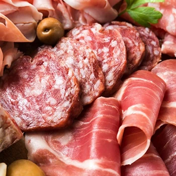 A close up shot of different lunch meat and cold cuts